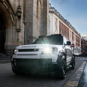 A Borasco Grey Apache Defender 90 parked in front of a church in Leeds City Centre